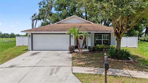 Photo of 15373 Callista Lane, Dade City, FL 33523 (MLS # W7887926)