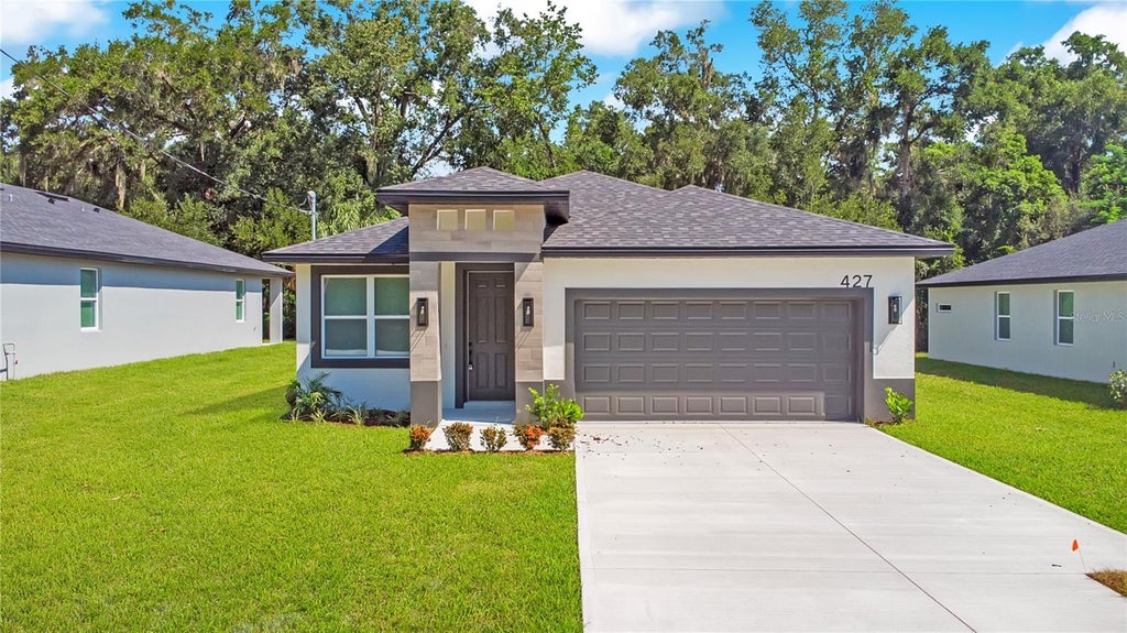 Photo of 427 E 13th Street, Apopka, FL 32703 (MLS # O6437890)