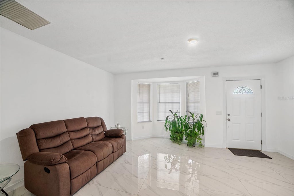 Photo of 201 Great Yarmouth Court, Kissimmee, FL 34758 (MLS # O6414983)