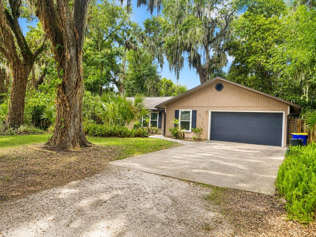 Photo of 2210 Needle Palm Drive, Edgewater, FL 32141 (MLS # NS1088221)