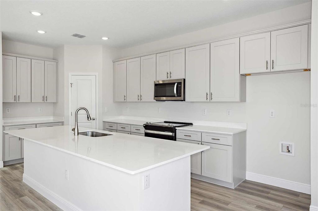 Photo of 10017 Surrey Rose Drive, San Antonio, FL 33576 (MLS # TB8384359)