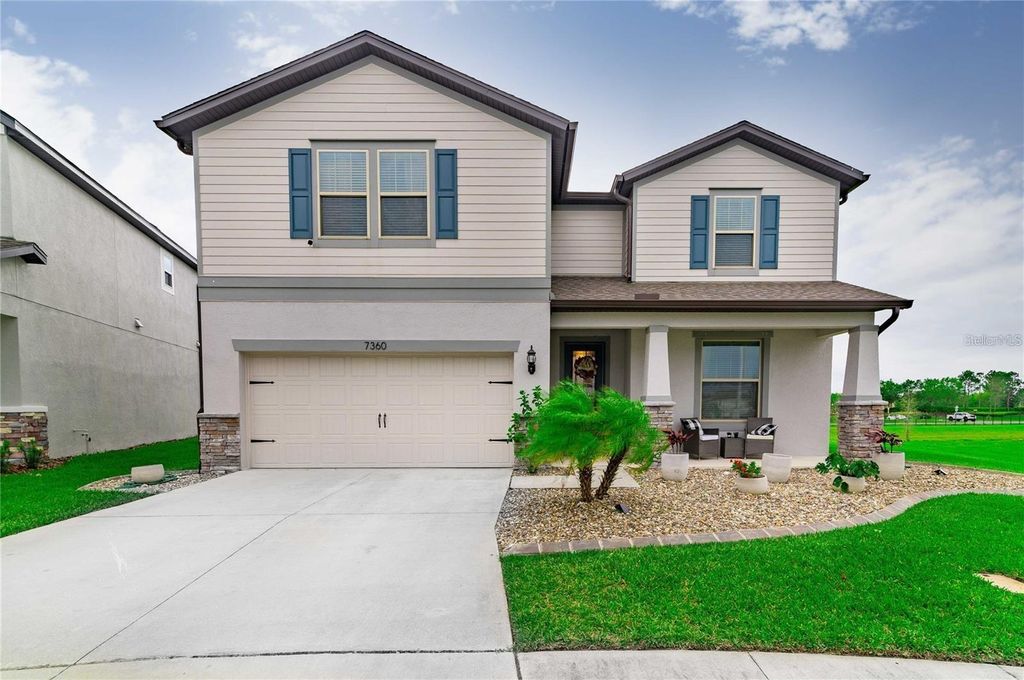 Photo of 7360 Pool Compass Loop, Wesley Chapel, FL 33545 (MLS # TB8472410)