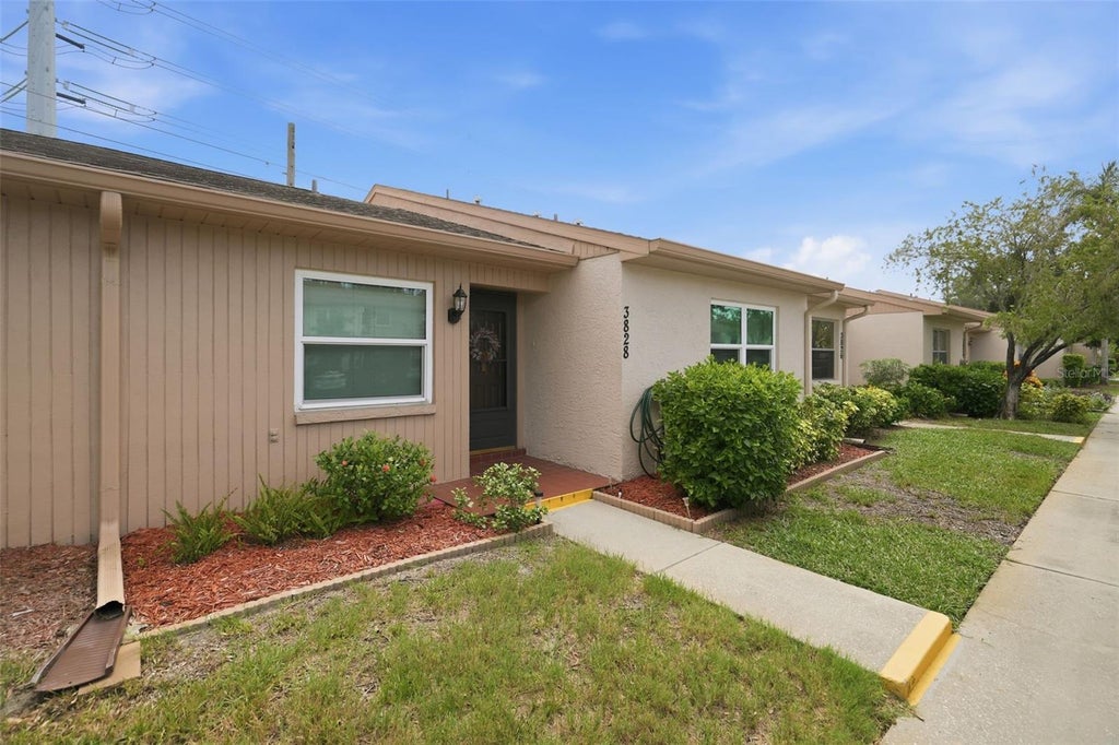 Photo of 3828 Sailmaker Lane, Holiday, FL 34691 (MLS # TB8542704)