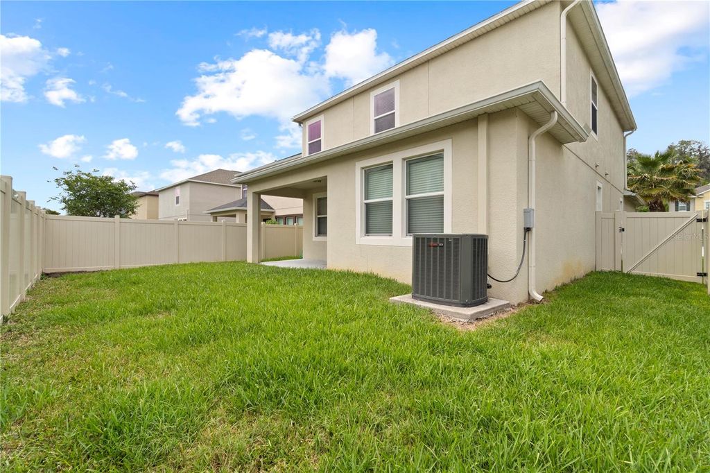 Photo of 1588 Ludington Avenue, Wesley Chapel, FL 33543 (MLS # OM722728)