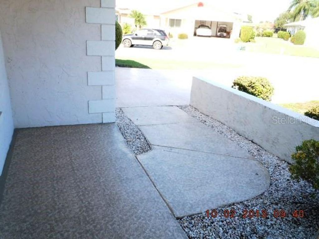 Photo of 114 Wintersong Lane, Sun City Center, FL 33573 (MLS # TB8497233)