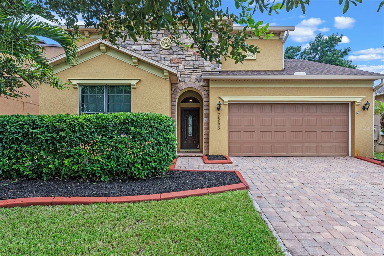 Only 30 minutes from Orlando's world-famous theme parks! Gorgeous 3-bedroom, 2.5-bathroom home in gated Arden Park South. Designed with a split-bedroom layout and soaring 9-foot ceilings, the open floor plan flows effortlessly from room to room. The spacious kitchen boasts a large center island with bar seating, granite countertops, a gas stove, and a double oven, perfect for entertaining family and friends. A convenient half bath near the main living area adds to the home?s thoughtful design. The master suite is a true retreat, complete with coffered ceilings, and a luxurious ensuite featuring split vanities, a walk-in shower, and a large walk-in closet. Dog owners will love the fully fenced yard, providing a safe space for pets to play! The oversized, paved, and screened-in patio is ready for your dream summer kitchen, with water and electric already in place. Residents of Arden Park enjoy walking trails, a refreshing community pool, fitness center, playground, and clubhouse. This prime location provides easy access to shopping, dining, major expressways, and Orlando International Airport while maintaining a peaceful neighborhood feel. Schedule your private showing of this lovely home today!