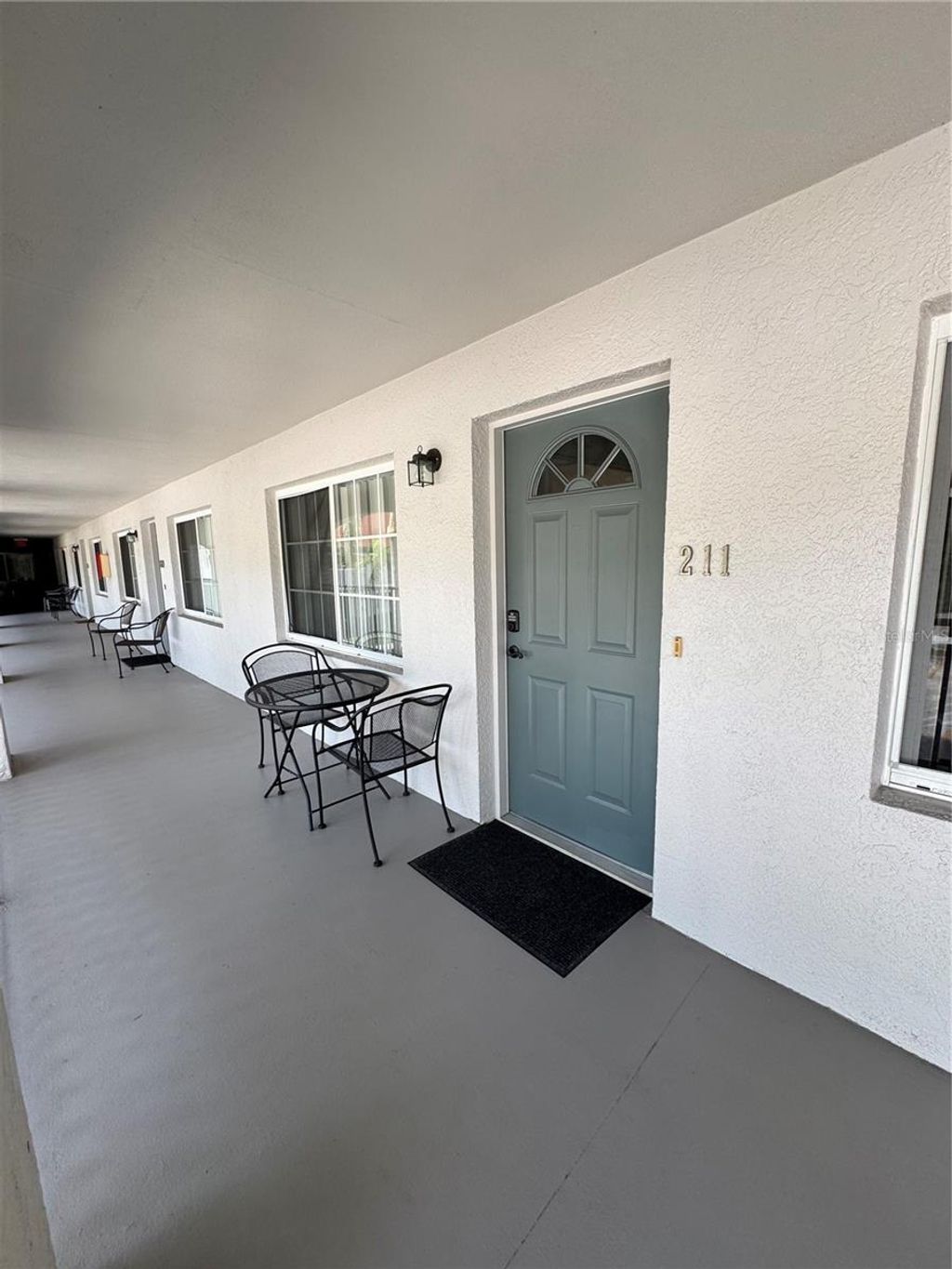 Photo of 4457 W 45th Avenue #211, Bradenton, FL 34210 (MLS # A4690915)