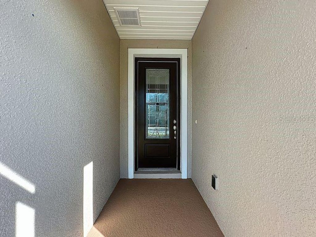 Photo of 537 Narrow View Lane, Groveland, FL 34736 (MLS # O6351909)