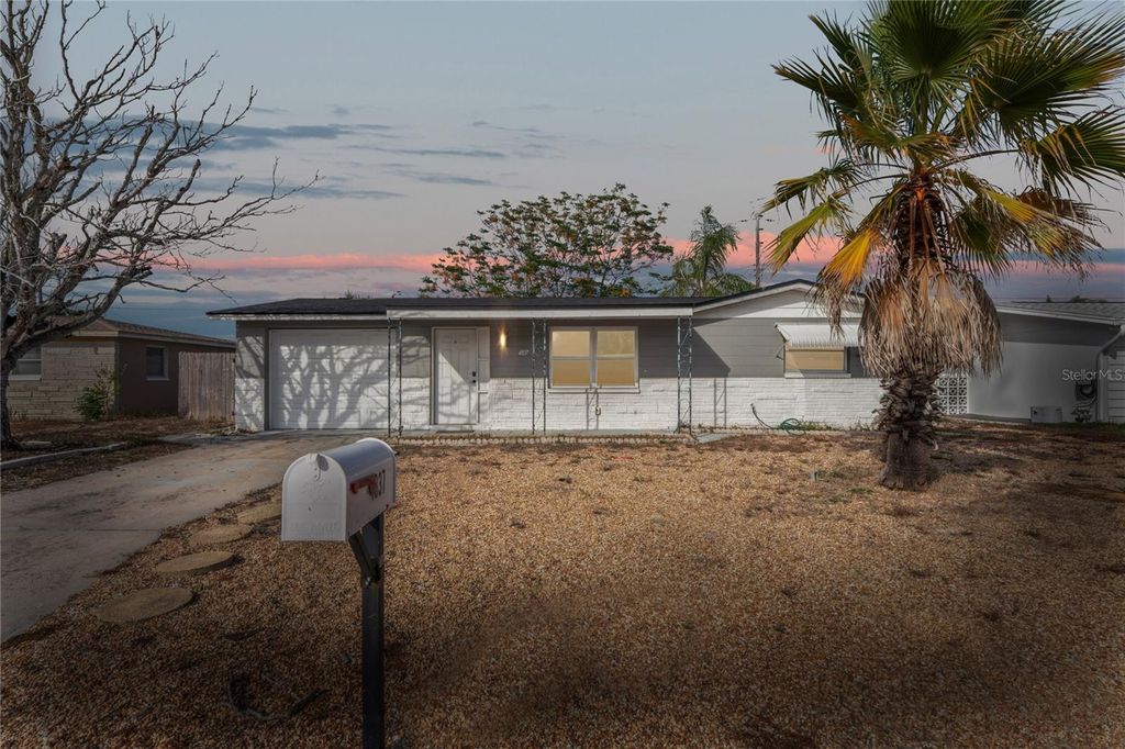 Photo of 4837 Vision Avenue, Holiday, FL 34690 (MLS # TB8454543)