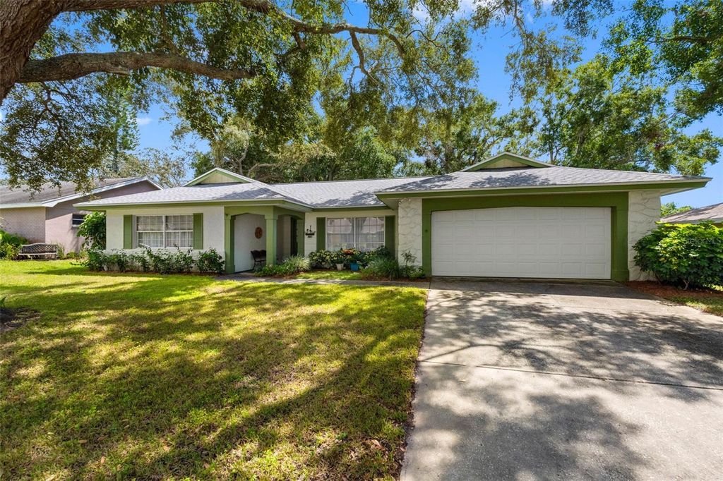 Photo of 1217 Royal Oak Drive, Dunedin, FL 34698 (MLS # TB8431663)
