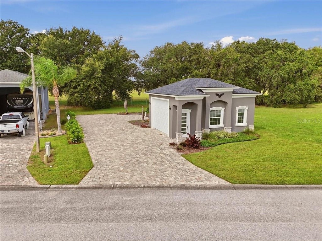 Photo of 122 Laynewade Road, Polk City, FL 33868 (MLS # L4965250)