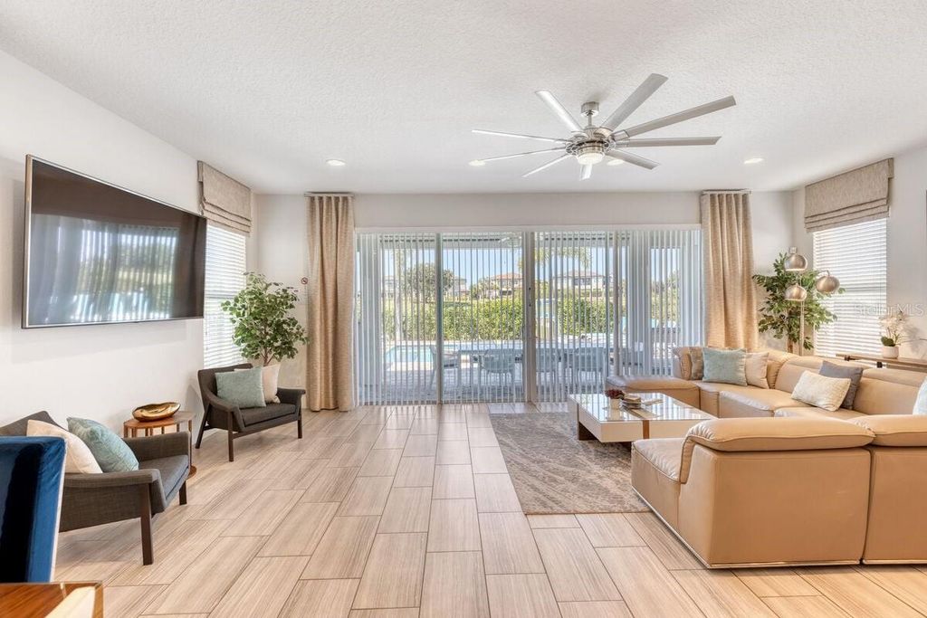 Photo of 1036 Castle Pines Court, Reunion, FL 34747 (MLS # O6349538)