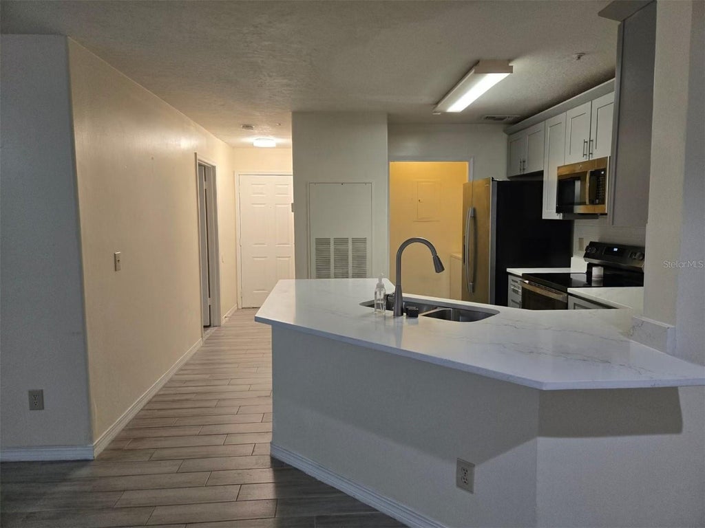 Photo of 7667 N Wickham Road #1202, Melbourne, FL 32940 (MLS # O6452483)