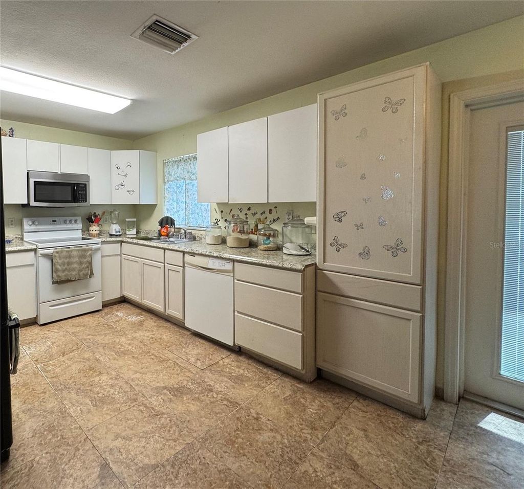 Photo of 12309 Cambridge Avenue, Tampa, FL 33624 (MLS # L4961776)
