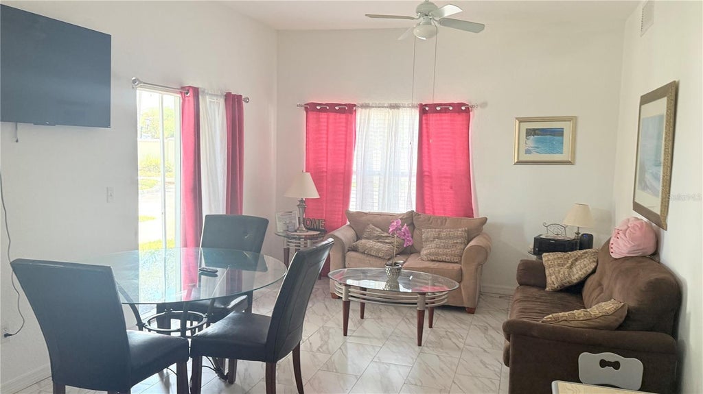 Photo of 2606 Lodi Circle #108, Kissimmee, FL 34746 (MLS # O6452308)