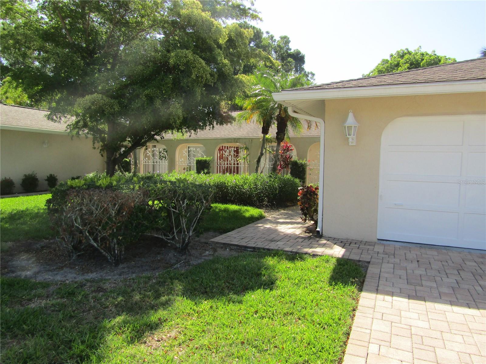 Enjoy your winter vacation in the comfortable surroundings of this graciously decorated 2 bedroom 2 bath villa. The home offers a master bedroom with private access to the master bathroom, closet space for all your "Fun-in-the-Sun" wardrobe and a guest bedroom with bath. The kitchen has been recently remodeled with beautiful cabinetry and quartz countertops, as well as upgraded stainless appliances. Washer and dryer are conveniently located in guest bedroom closet area instead of the garage. The lanai has been glass enclosed which adds to the living space in the property and overlooks a courtyard view. Just steps away from the community heated pool. Situated in the "Heart of the Meadows" you will enjoy walking through the lush foliage as you hike along the 13 miles of walking trails. The Meadows is close to the UTC Mall, Benderson Rowing Park, downtown Sarasota and the numerous area beaches. Reserve this villa for your winter vacation. This property is a NO PET and NO SMOKING unit.