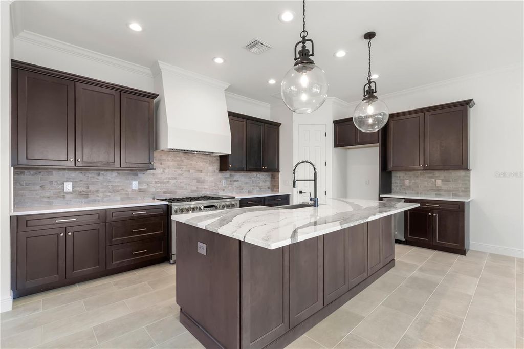 Photo of 411 Tennessee Avenue, Crystal Beach, FL 34681 (MLS # TB8447049)