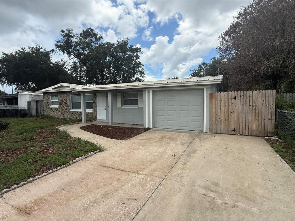 Photo of 6308 Ravinnia Drive, Orlando, FL 32809 (MLS # O6433715)