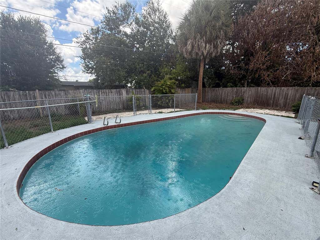 Photo of 6308 Ravinnia Drive, Orlando, FL 32809 (MLS # O6433715)