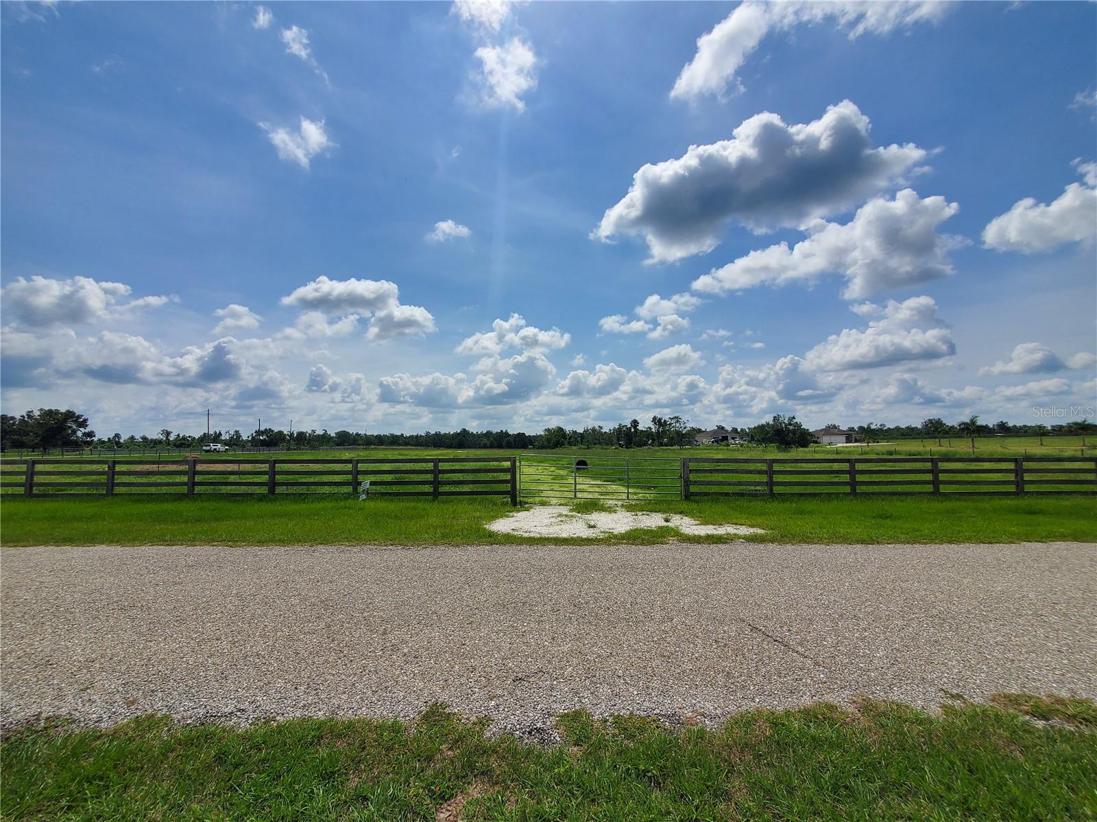 Under contract-accepting backup offers. Escape the hustle and bustle of city life and immerse yourself in the tranquility of Arcadia, Florida. We proudly present an opportunity to own a magnificent 5-acre buildable, cleared lot, waiting to be transformed into your own personal paradise. The Sellers have already put the base for the driveway in and built up where the house could sit. Despite its peaceful seclusion, this prime location is only a short drive away from a range of attractions. Enjoy easy access to Arcadia's charming downtown, which boasts a rich historical heritage, eclectic shops, delightful restaurants, and frequent community events. Additionally, by Car, you can be at Siesta Key in 45 Minutes, Downtown Sarasota in 55 Minutes, Punta Gorda Airport in 20 Minutes, Publix in less than 10 Minutes and Port Charlotte Town Center is 30 Minutes.