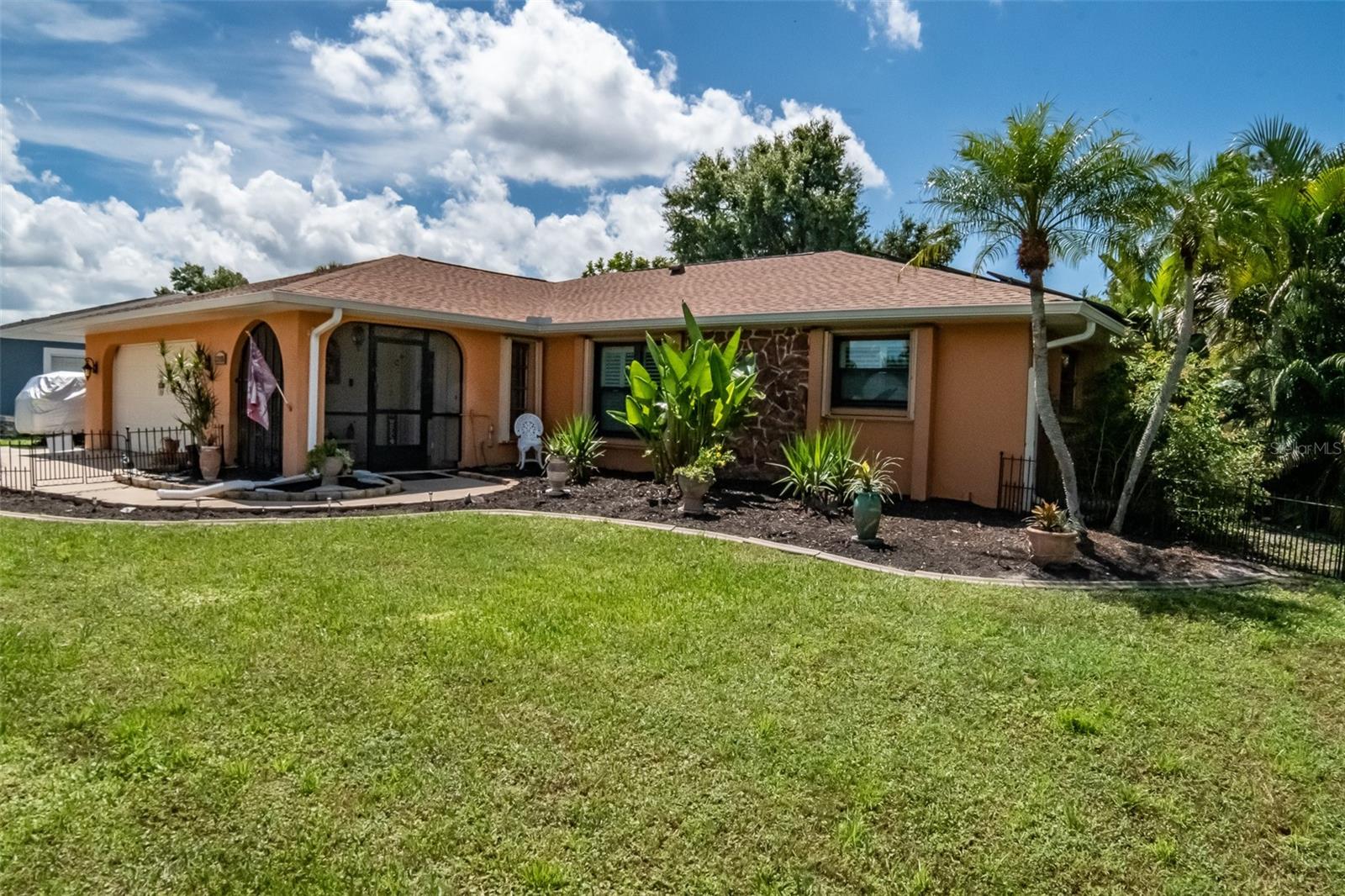 Port Charlotte 3-Bedroom Pool Home – No Flood Zone!
Discover this beautifully updated 3 bedroom, 2 bath, 2-car garage home with a heated saltwater pool in a desirable no flood zone location of Port Charlotte, FL. From the moment you arrive, you’ll notice pride of ownership throughout.
Step inside to find a formal living room, formal dining room, and a spacious family room—perfect for entertaining or relaxing. The kitchen features a breakfast bar, quartz countertops, and a super-versatile, high-tech stove ready for all your culinary adventures. An extra refrigerator in the garage provides bonus storage for beverages and party prep.
Interior updates include fresh paint throughout, plantation shutters, updated flooring, and a stylish barn door leading to the master bath. The master suite offers an updated walk-in shower and dual vessel sinks, while the guest bath features a handicap-accessible shower/tub combo for comfort and convenience.
The home also boasts new rear sliders, full hurricane protection, electrical updates, and solar panels on the roof (transferring to the buyer) for energy savings.
Step outside to your private screened lanai with a heated saltwater pool, perfect for year-round enjoyment. An extra parking area beside the garage is ideal for guests, boats, or multiple family vehicles.
This home is truly move-in ready—perfect for full-time living or as a Florida getaway.