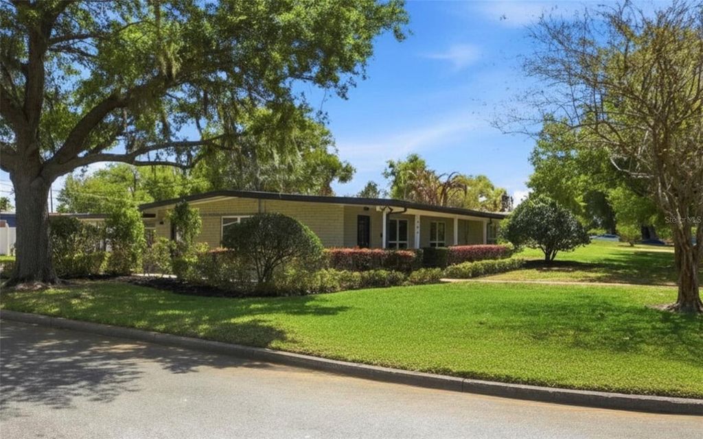 Photo of 701 Strathmore Drive, Orlando, FL 32803 (MLS # O6384225)