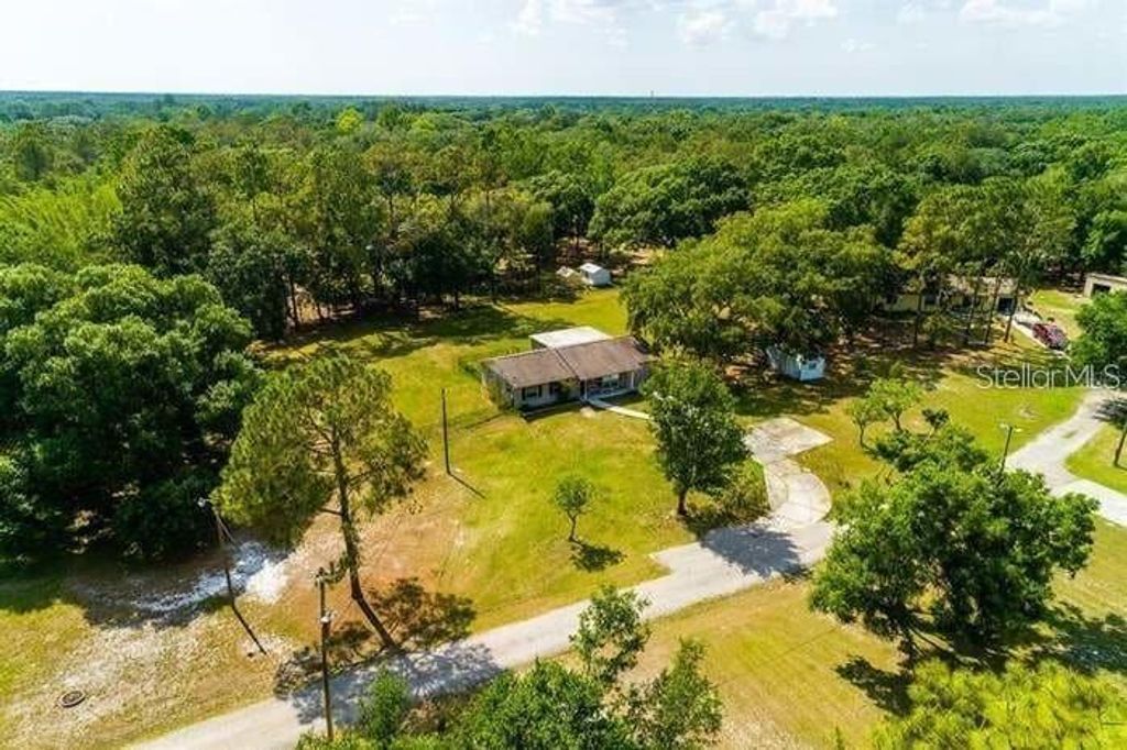 Photo of 6062 COUNTRY CLUB ROAD, WESLEY CHAPEL, FL 33544 (MLS # T3474590)