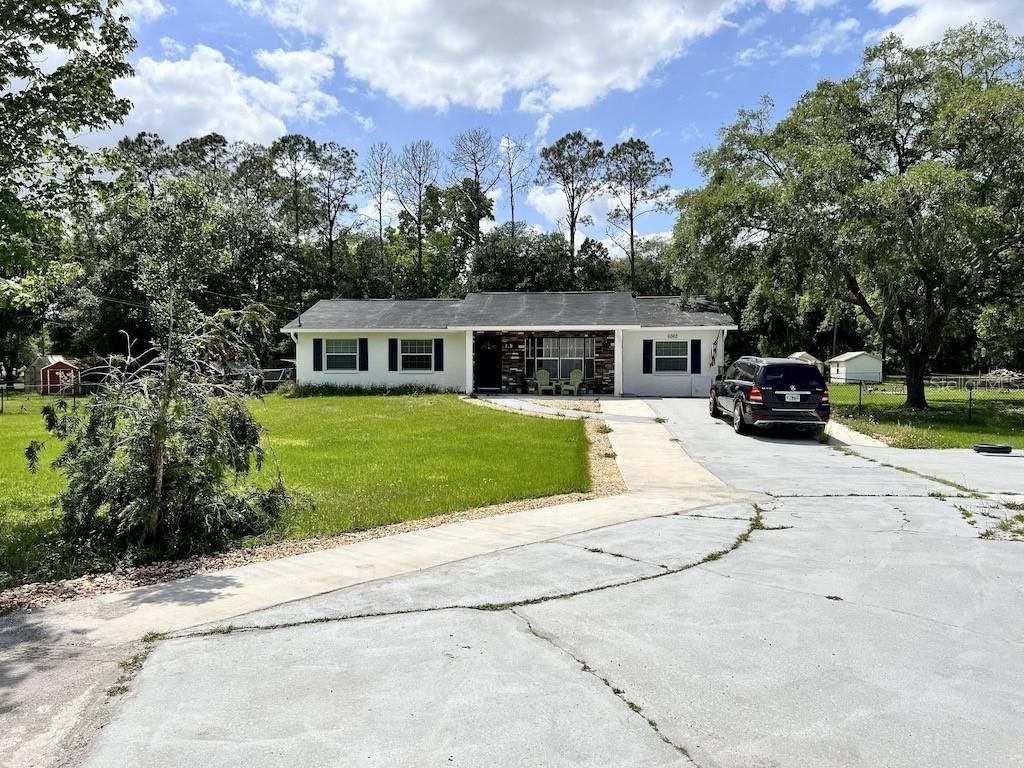 Photo of 6062 COUNTRY CLUB ROAD, WESLEY CHAPEL, FL 33544 (MLS # T3474590)