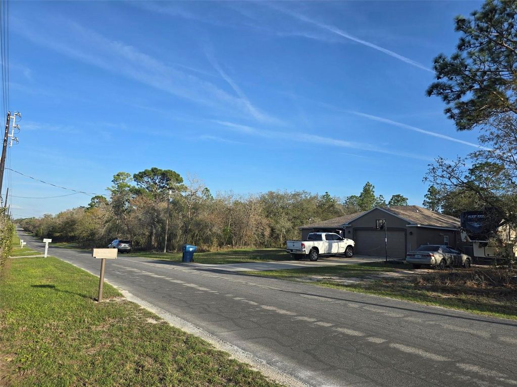 Photo of 13070 Quigley Avenue, Weeki Wachee, FL 34614 (MLS # W7883849)