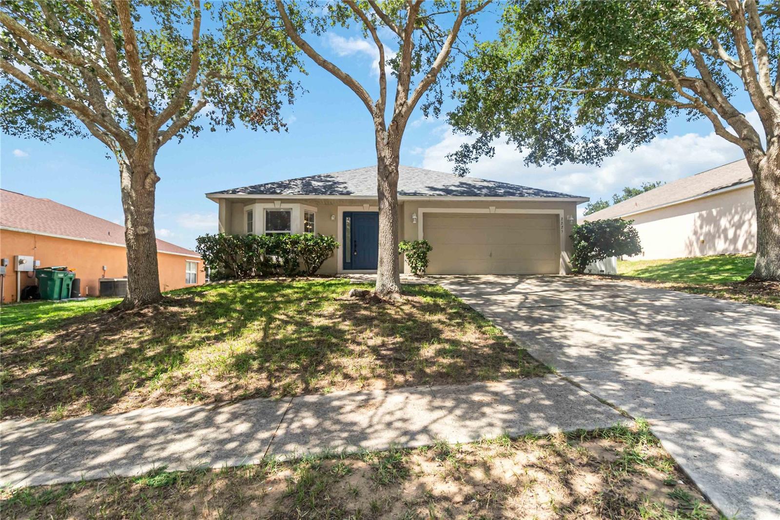 Tucked away in the quiet Quail Hollow community of Eustis, this lovingly cared-for 4-bedroom, 2-bath home blends everyday comfort with thoughtful design. Offering nearly 2,000 square feet of living space, a two-car garage, and a fully fenced backyard, this home is perfect for first-time buyers or a growing family ready to put down roots.Step inside and you’re welcomed by high cathedral ceilings, soft natural light from the bay window, and a charming nook ready for your favorite decor or heirloom piece. The formal living and dining area offers the perfect setting for quiet evenings or hosting guests.The heart of the home is the open-concept kitchen and family room. Stylish updated kitchen cabinets, stainless steel appliances, a bar-height counter, and a cozy breakfast nook, there’s space for cooking, conversation, and connection. Ceramic tile flows throughout the home for a clean, cohesive look that's also easy to maintain.The primary suite is spacious and serene, featuring a large walk-in closet, soaking tub, separate glass-enclosed shower, and a well-sized vanity. Down the hall are three additional bedrooms and a beautifully updated guest bath—ideal for visitors, kids, or a home office setup.Step outside to a private, fully fenced yard—great for kids, pets, or simply enjoying a quiet morning on the patio. Recent updates include FRESH interior paint, a NEW roof, NEW A/C and more!Conveniently located just minutes from Downtown Eustis, Mount Dora, and local shops and restaurants, this home is move-in ready and waiting for you to make it your own.
