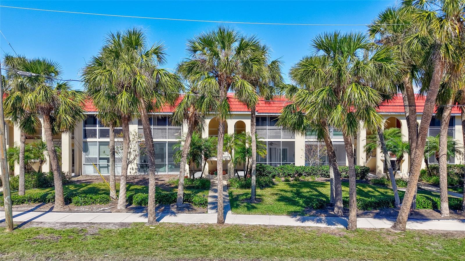 Discover this beautiful upstairs furnished condo in a highly desirable complex that is ideally situated in the Mira Mar neighborhood adjacent to the Siesta Key Village! Just a short stroll to the beach and mere moments from top dining, shopping, and nightlife, this unit is the ultimate coastal escape. Enjoy worry-free living with impact windows and sliding doors, a 2024 washer/dryer in the unit, and a 2022 water heater. NEW ROOF, no assessments, and no flooding concerns make this an exceptional find! Both the bathrooms and the kitchen have been tastefully renovated with sleek quartz countertops. The entire unit features neutral ceramic plank-tile flooring and a cohesive neutral palette throughout. Unwind on your screened in lanai, enveloped by lush palms and tropical greenery. Leave your car at home and soak in the beauty of Siesta Key Beach—ranked the #1 beach in the U.S. You are just 2/10 of a mile away from Sunset Pier where pristine white quartz sand, crystal-clear waters, and breathtaking sunsets await. Whether you're seeking a primary residence or the perfect island getaway, this beautifully maintained boutique community of just 16 condos offers an unbeatable location. Don’t miss this rare opportunity!
