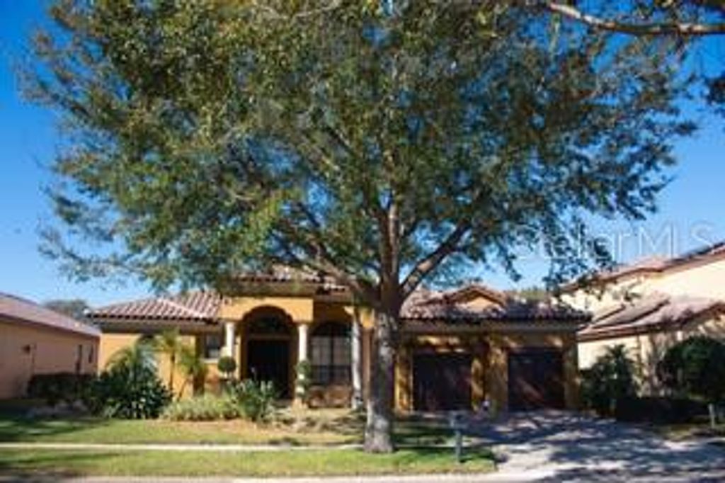 Photo of 7414 Pointe Venezia Drive, Orlando, FL 32836 (MLS # A4682510)