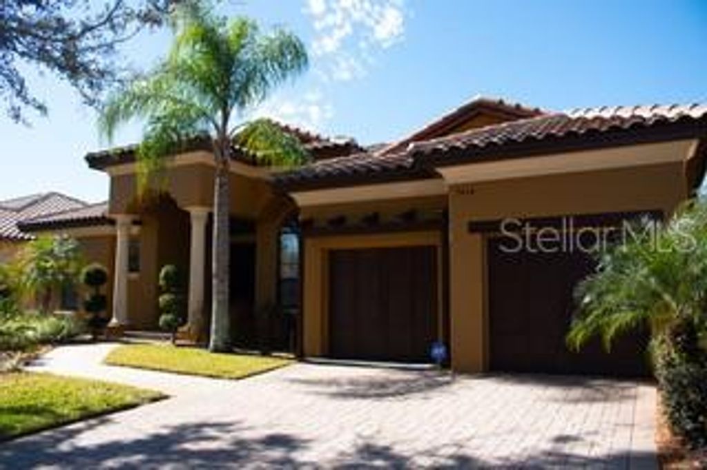 Photo of 7414 Pointe Venezia Drive, Orlando, FL 32836 (MLS # A4682510)