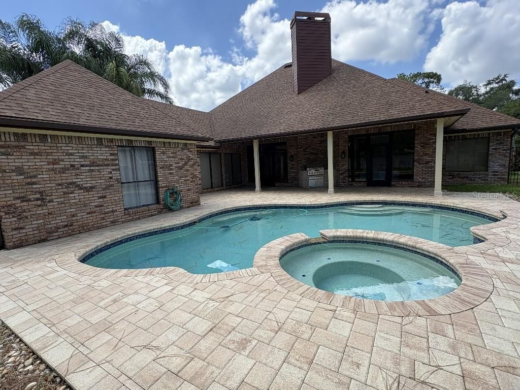 Photo of 10484 Longwood Drive, Seminole, FL 33777 (MLS # TB8525498)