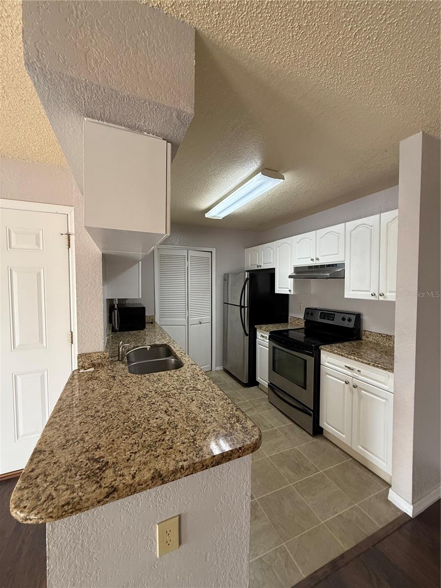Photo of 2550 N Alafaya Trail #6203, Orlando, FL 32826 (MLS # O6454184)