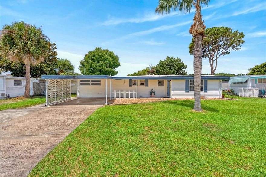 Fully furnished and uniquely designed, this spacious 3 bed/2 bath home perfectly combines comfort and functionality. Step inside to find an expansive living area featuring a sunken bonus space to extend your living options. The kitchen boasts Whirlpool stainless steel appliances, a custom built-in pantry, and an adaptable island that can be repositioned to customize your workflow. The primary bedroom showcases a walk-in closet and an ensuite equipped with a convenient indoor laundry space, while two additional bedrooms provide the perfect setup for a guest room, home office, or hobby area. Through the sliding doors is a versatile converted bonus/Additional Bedroom/Florida room, uniquely equipped with a walk-in closet and removable panels that expose the window-lined walls for a true Florida Room. Both this bonus room and the adjacent storage shed/workshop-featuring ample space for golf cart parking and dual interior/exterior access-were masterfully built over a filled-in pool. Outside, enjoy a double driveway with a single carport and a partially fenced backyard for added privacy. HOA/COMMUNITY: Imperial Terrace West is a highly desirable 55+ retirement community offering AMENITIES galore! Community amenities include a clubhouse, boat slips, Harris Chain of Lakes access, shuffleboard courts, an indoor pool and hot tub, and so much more! Featuring a low HOA fee and NO LOT RENT - you OWN the land! Imperial Terrace is located off Hwy 441, just minutes from shopping, dining, entertainment, state-of-the-art medical facilities, PLUS, renowned local destinations - Mount Dora and The Villages! Easily commute to the beach coasts, Orlando attractions, airports and everywhere exciting that makes Floridians love living ‘central’ in the Sunshine State, year ‘round or seasonal. Call to schedule your personal tour today!