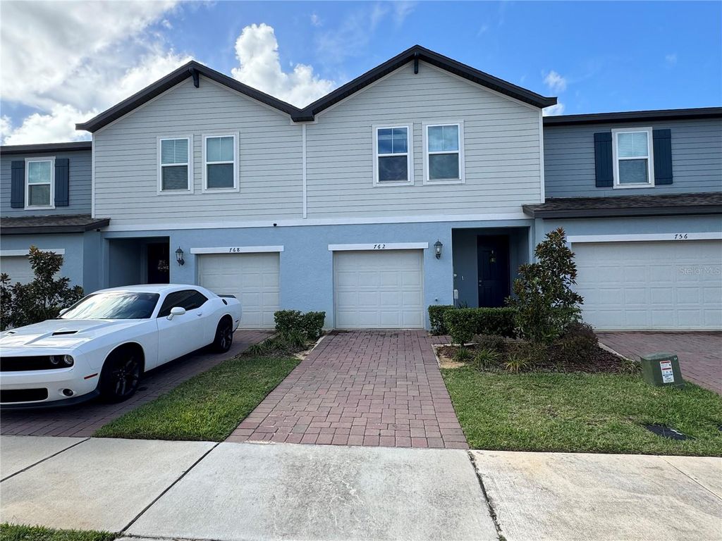 Photo of 762 Legacy Drive, Davenport, FL 33896 (MLS # O6358366)