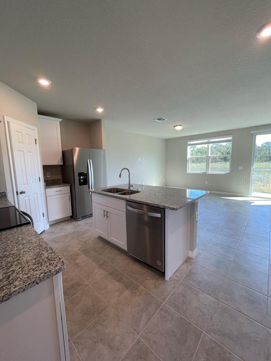 Photo of 762 Legacy Drive, Davenport, FL 33896 (MLS # O6358366)