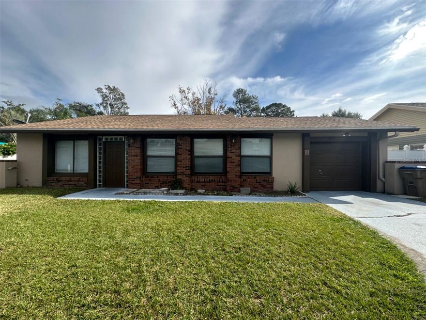 Cannot beat this location. Down the block from transportation, shopping, town center and so much more. This 2 bedroom 1 bath home is perfect for anyone who wants to be where the action in Poinciana is. This property is an oldy but a goodie. Enjoy a relaxing weekend or evening on the screened in patio overlooking a nice yard. Two spacious bedrooms. Fantastic Florida room/front patio and so much more. Great home and priced below market value!!