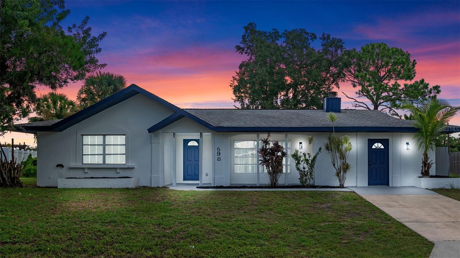 Welcome to this Fully Renovated 3-bedroom, 2-bathroom Pool home located in the highly desirable Port Malabar community of Palm Bay, Florida. Situated on a spacious 0.33-acre fenced lot with no HOA, this home offers the perfect blend of style, comfort, and privacy. From the moment you arrive, you’ll be drawn in by the eye-catching curb appeal and meticulously maintained landscaping. Step inside to find brand new luxury vinyl plank flooring throughout the main living areas, creating a fresh and modern feel. The updated kitchen is designed for both function and beauty, featuring brand-new stainless steel appliances, quartz countertops, and a charming window that provides a view of the pool area. The open layout is perfect for entertaining or enjoying quiet evenings at home. Each bedroom is filled with natural light thanks to large windows, creating bright and airy spaces. The primary suite includes a beautifully updated bathroom with a sleek modern vanity, smart mirror, and a tiled walk-in shower for a spa-like experience. In the heart of the home, the living room showcases a stunning wood-burning stone fireplace that adds warmth and character. A sliding glass door leads to the screened-in pool area, where you can relax or host gatherings while enjoying views of the expansive backyard. This outdoor oasis offers plenty of space for entertaining, playing, or simply unwinding at the end of the day. A shed in the backyard provides additional storage for tools, equipment, or seasonal items. Conveniently located near shopping, dining, schools, and beaches, this fully renovated pool home in Port Malabar combines modern living with classic Florida charm in a peaceful, established neighborhood.