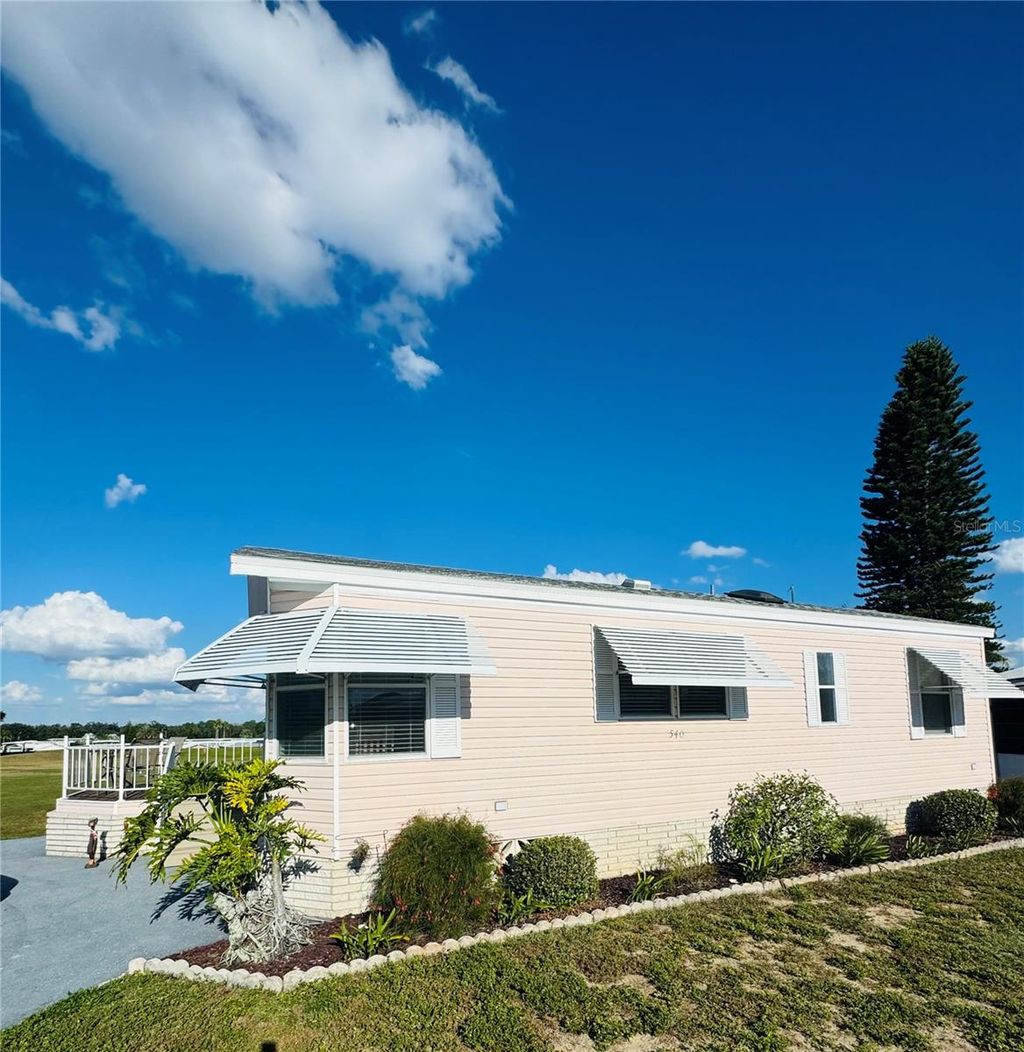 Photo of 540 Gary Player Drive, Davenport, FL 33837 (MLS # O6354688)