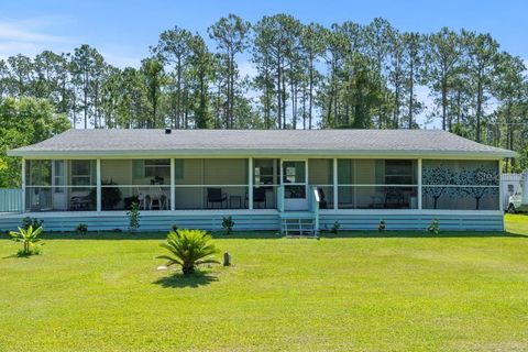 Photo of 1597 Water Oak Road, Bunnell, FL 32110 (MLS # FC316535)