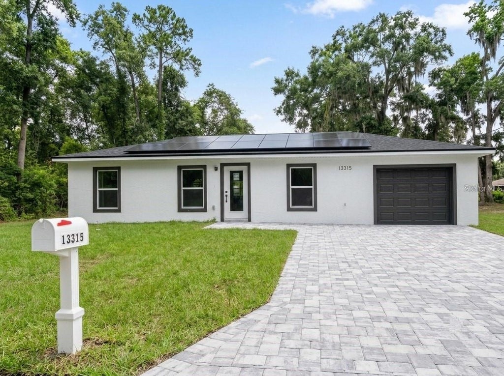 Photo of 13315 SE 38th Court, Belleview, FL 34420 (MLS # S5159484)