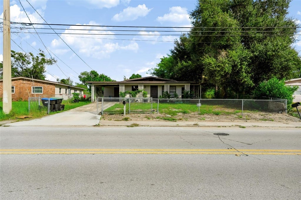 Photo of 1815 Kingsland Avenue, Orlando, FL 32808 (MLS # TB8557559)
