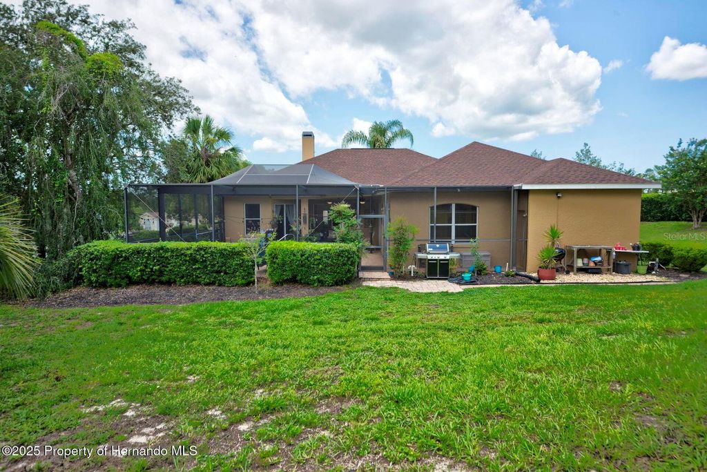 Photo of 11422 Warm Wind Way, Weeki Wachee, FL 34613 (MLS # W7878349)