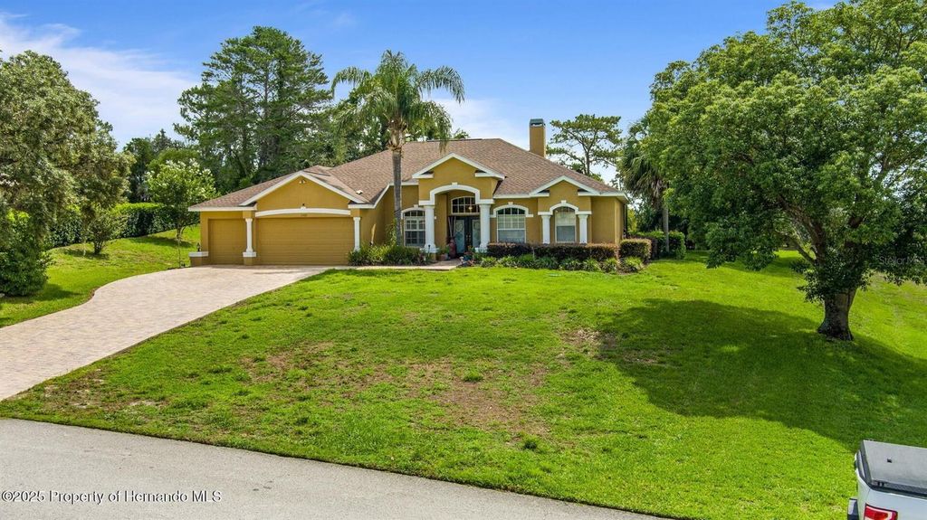 Photo of 11422 Warm Wind Way, Weeki Wachee, FL 34613 (MLS # W7878349)