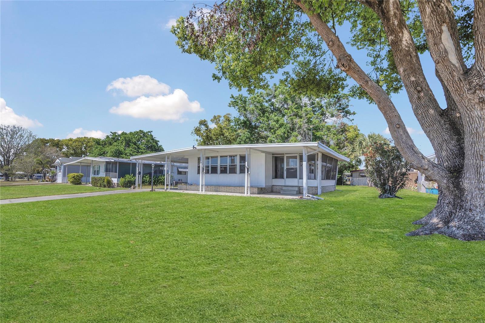 Investor Alert....A charming 2-bedroom, 2-bath home located in the desirable Lake Frances Estates in Tavares, Florida. This conveniently situated home places you in the heart of central Florida, offering easy access to everything the region has available. With an affordable HOA fee that includes a variety of amenities, this community is perfect for relaxed and enjoyable living. Built in 1974, this home features a thoughtfully designed 1,200 sq. ft. floorplan, ensuring both comfort and functionality. The floor needs a lot of TLC. The right owner can make this their home with a little effort. Ask the owners agent about possibilities. Seller will repair floors with a full price offer.