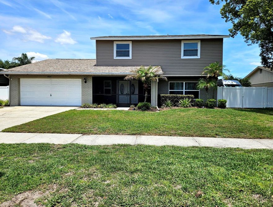 Located in the desirable Bloomingdale community, this beautiful 3 bedroom, 2 ½ bathroom home welcomes you with a large screened front porch and elegant double glass doors.  As you enter through the front doors, you will have an immediate sight line straight to and through the back French doors leading out to the spacious lanai and sparkling POOL.  The living and dining room combo area can easily accommodate large family gatherings.  The updated kitchen has granite countertops over plenty of soft close wood cabinets and prep island along with stainless steel appliances. The kitchen and eat-in area overlook the comfortable family room with its inviting and cozy fireplace.  Located on the second floor, the spacious primary bedroom has a large walk-in closet and a thoughtfully designed CUSTOM EN SUITE consisting of a separate shower, tranquil deep soaker tub, huge double sink vanity along with a separate makeup vanity.   Granite countertops and LOADS OF STORAGE complete this stunning bathroom.  The OFFICE (which can also be used as a 4th bedroom) and secondary bedrooms are also located on the second floor.  The inside laundry room has a nice custom built drop zone with a seat and hooks for book bags, etc. This home has many additional upgrades including vinyl siding, vinyl double pane windows, 6 panel interior doors, and 12mm laminate flooring.   As a bonus, this property has a concrete grass paver pad on the side yard for your RV or boat!  A 30 amp outlet is located near the driveway.  The garage has a walkable attic storage space, an under-stair storage area, and a semi-attached WORK SHED with large work bench.  ROOF (2023).  
Bloomingdale Park is a short walk or drive away where you will find tennis courts, pickleball courts, basketball courts and a playground.  Bloomingdale Golf Course and the Campo Family YMCA are also located within the neighborhood.  Various grocery stores, shopping and great restaurants are nearby.  Close access to I-75, I-4, and the crosstown expressway aids an easy commute to Tampa, MacDill AFB, and Tampa International Airport.