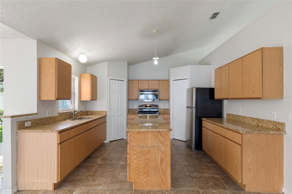 Photo of 14006 Amero Lane, Spring Hill, FL 34609 (MLS # TB8400279)