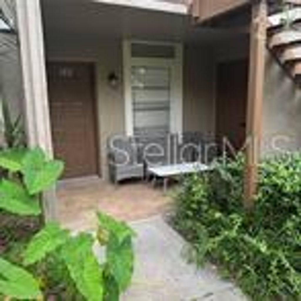Photo of 14219 Shadow Moss Lane #102, Tampa, FL 33613 (MLS # TB8480189)